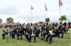 The Army National Guard’s 40th Infantry Division Band, under the direction of Chief Warrant Officer Eric Sugunamu, played patriotic musical selections. Veterans of each of the nation’s uniformed services stood for recognition as a soloist sang their service’s song.