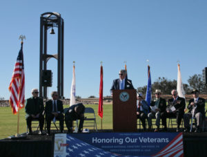 Dennis A. Schoville, President & CEO of the Miramar National Cemetery Support Foundation, welcomes some 200 veterans, active duty military, and families to the dedication of the Veterans Tribute Tower & Carillon.